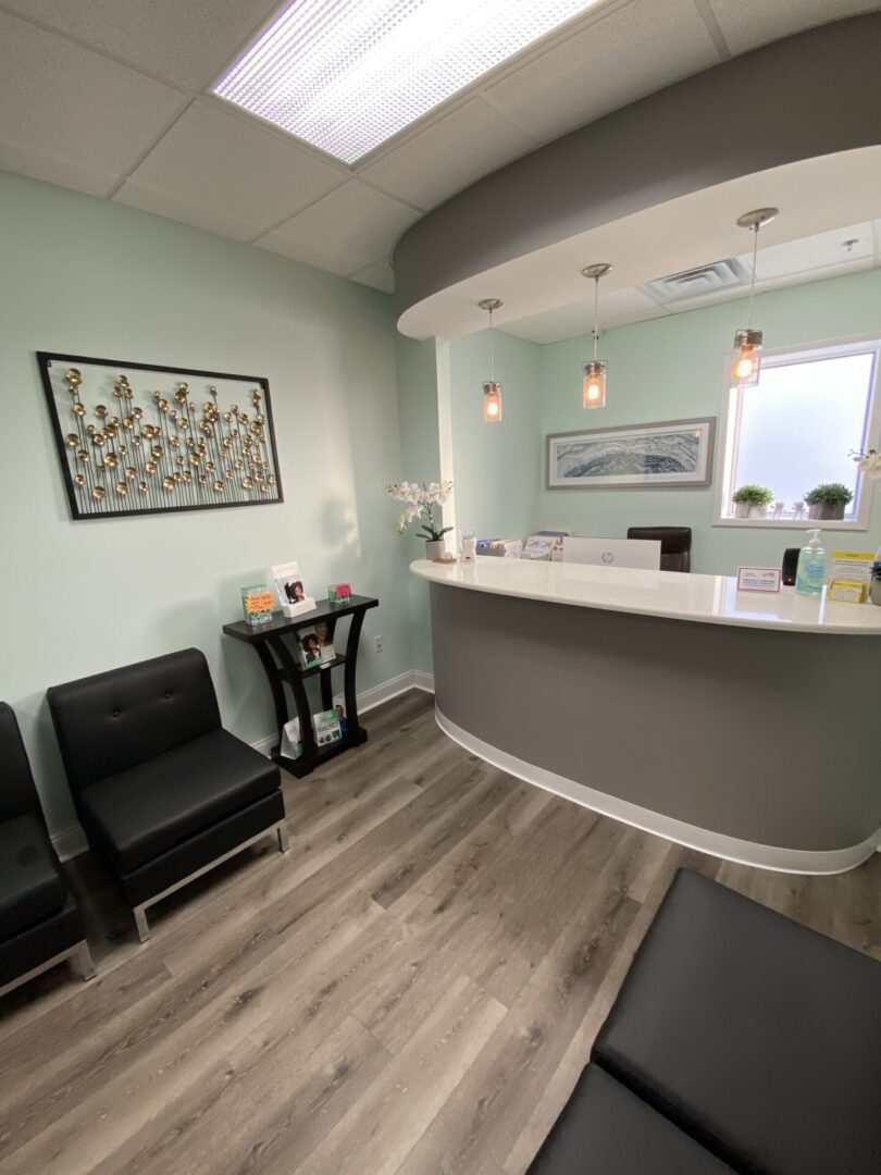 A view of the reception area of a dentist 's office.